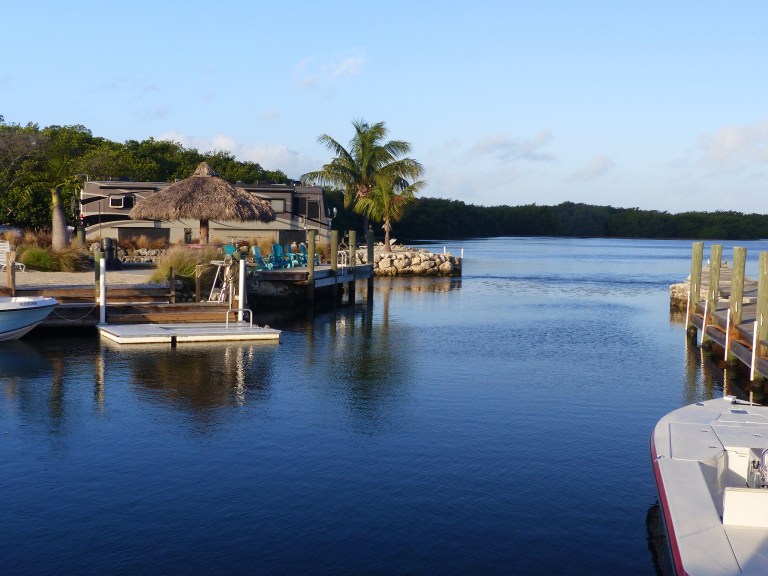 Colorful chairs on the dock begging us to come sit and relax.